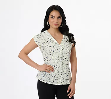 293842-unique-vintage-1960s-twill-button-front-sleeveless-blouse-1.webp