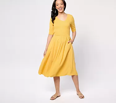 297663-peace-loved-world-petite-knit-to-woven-asymmetric-v-neck-dress-1.webp