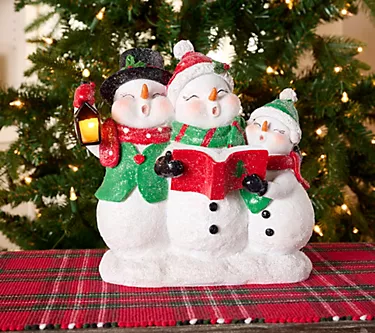 Singing Snowman Family with Illuminated Lantern by Valerie